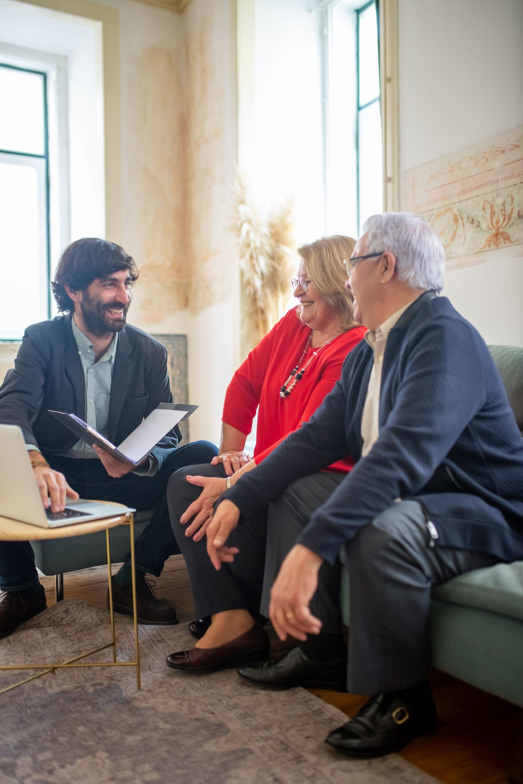 Older adults meeting with a professional to discuss care planning